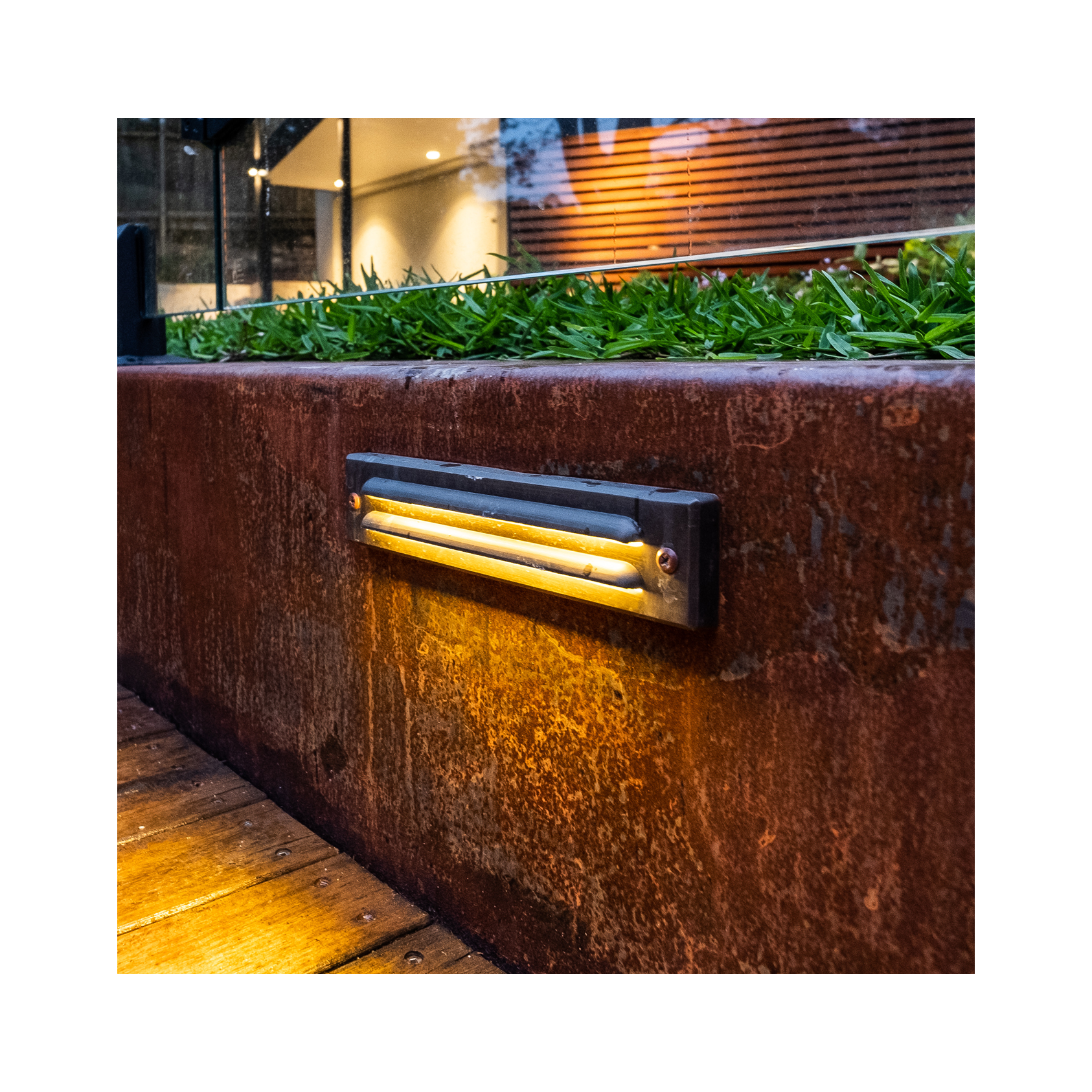Slotted solid cast brass steplight designed for wall mounted step lighting. - Image 4